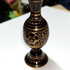 A beautiful brass black etch vase